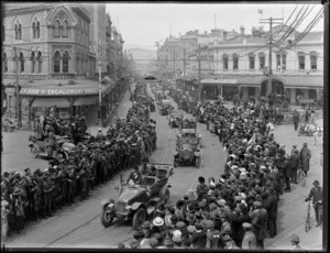 A parade of soldiers in motor cars through the streets of Christchurch, [after World War I?]