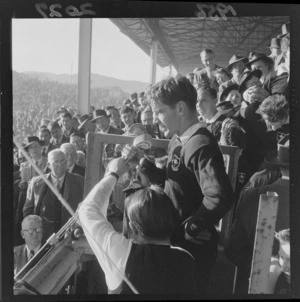 1956 Springbok rugby union football tour, J B Buxton, captain of the New Zealand Universities team addresses the crowd at Athletic Park, Wellington