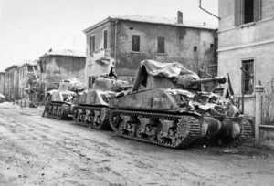 Wilson, Stuart, fl 1944 :Tanks of 2nd NZEF, 19th Armoured Regiment, under falling snow on Christmas Eve, at Faenza, Italy