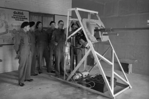 Sergeant R M Morse, intructs a class on a working model of the Westinghouse Gyro Stabilizer, at the NZ Armoured Training School in Maadi, Cairo, Egypt