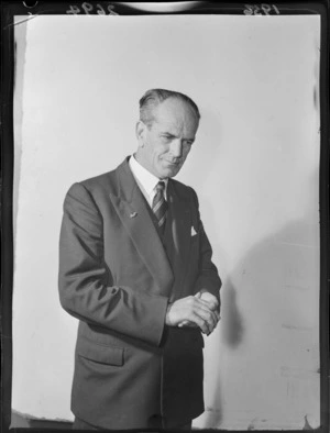 Campaign portrait of Ernest Richard Toop, 1956 mayoral candidate for Wellington, gesticulating