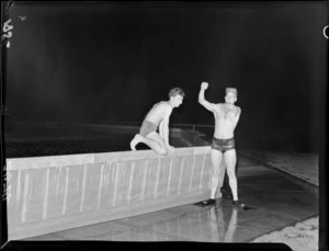 Unidentified swimmers at night, climbing out of the fountain at Kelburn Park, after its opening, Wellington
