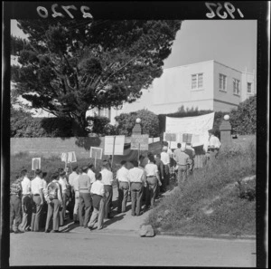 Protestors stage a demonstration outside the Soviet Legation, 57 Messines Road, Karori, Wellington, including banners and placards and a coffin labelled 'The Body of Freedom'