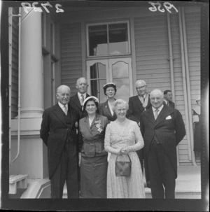 Governor General Sir Charles Willoughby Moke Norrie, Lady Patricia Merryweather Norrie, [Mayor?] Robert Macalister, and other unidentified men and women who have been honoured with investitures, Government House, Wellington