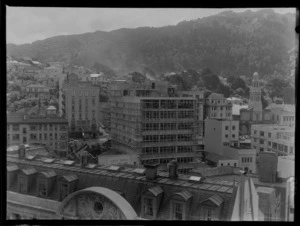 Construction of the Meat and Wool Board Building, Lambton Quay, Wellington, including St Andrew's Church, Royal Hotel, the roof of the Public Trust Building, and Botanic Gardens