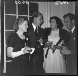 Unidentified guests at a cocktail party held for double-amputee and World War II veteran Douglas Robert Steuart Bader
