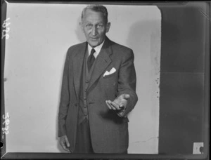 Campaign portrait of Julius Hyde, 1956 Mayoral candidate for Wellington, gesticulating