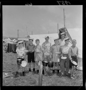 Sea Cadets posing with meal, plates and spoons at camp in Ngati Toa Domain, Wellington