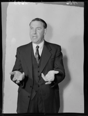 Campaign portrait of Francis (Frank) Joseph Kitts, 1956 mayoral candidate for Wellington, gesticulating