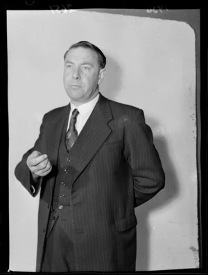 Campaign portrait of Francis (Frank) Joseph Kitts, 1956 mayoral candidate for Wellington, gesticulating