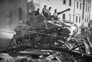 Kaye, George, b 1914:Sherman tank and soldiers of the 2nd NZEF 4th Amoured Brigade, in Bentivoglio, Italy