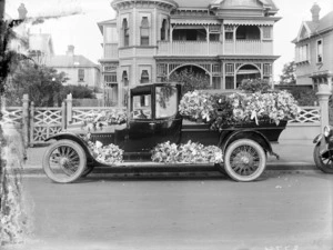 Hearse decorated with flowers, Latimer Square, Christchurch