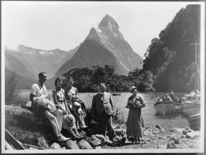 Raine, William Hall, 1892-1955 :Group photograph taken at Milford Sound