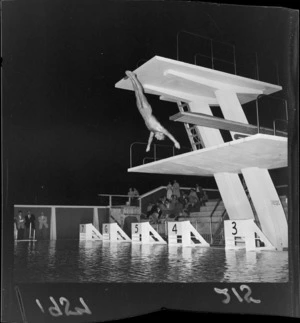 Mr G Fitzgerald, New Zealand diving champion demonstrates his skills at Naenae Swimming Pool, Lower Hutt