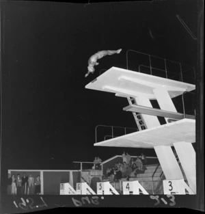 Mr G Fitzgerald, New Zealand diving champion demonstrates his skills at Naenae swimming pool, Lower Hutt