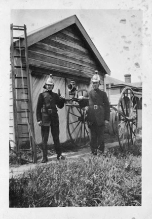 Firemen with the Station Street Brigade handcart, Upper Hutt, Wellington