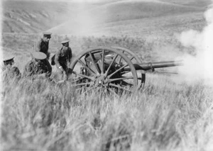 Soldiers firing a cannon, army training exercise