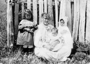 Unidentified Maori woman with children