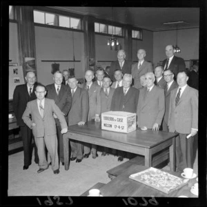 Prime Minister Walter Nash and Members of Parliament and Apple and Pear Board with the one millionth case of fruit produced, Nelson
