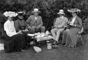 The Broad family taking tea outdoors
