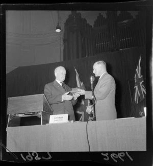 K W Fraser, Dominion President of the New Zealand Returned Services Association, presents a gift to Governor General Charles Willoughby Norrie