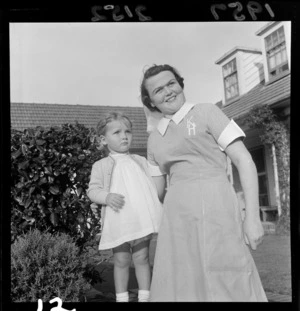 The Royal New Zealand Plunket Society, Karitane Home, little girl and nurse, [Island Bay, Wellington?]