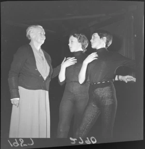 Miss Estelle Beere teaching dance movements to children at her Hill Street studio, Thorndon, Wellington