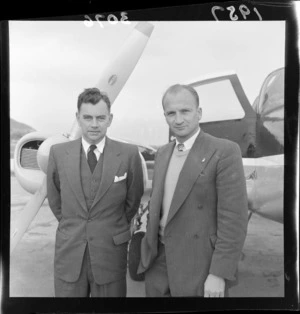 Phil Lightband and Miles King in front of a Cessna 310 aircraft, Wellington airport