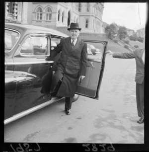 Prime minister Sidney Holland arriving at Parliament after an absence due to illness