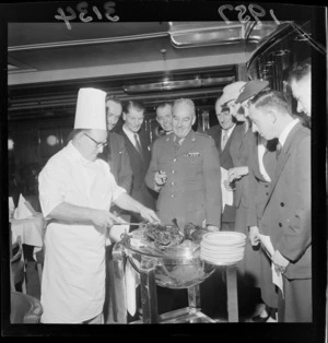 An unidentified chef cooking meat on the ship Dominion Monarch