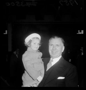 Prime Minister Sidney George Holland holding the Governor General Lord Cobham's daughter Lucy