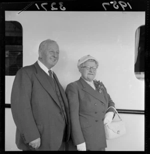 Unidentified man and woman leaving on the ship Dominion Monarch