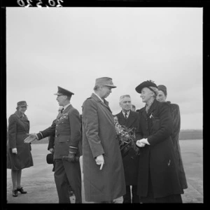 Mrs Eleanor Roosevelt talking to Janet Fraser, wife of the New Zealand Prime Minister, after arriving at an Auckland airfield