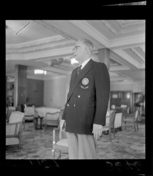 Unidentified man modelling a blazer, to be worn at the British Empire Games