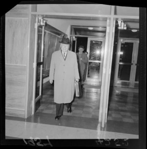 Walter Nash arriving at parliament for an election meeting
