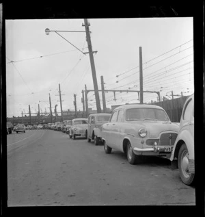 Thorndon Quay, Wellington, with cars parked on the side