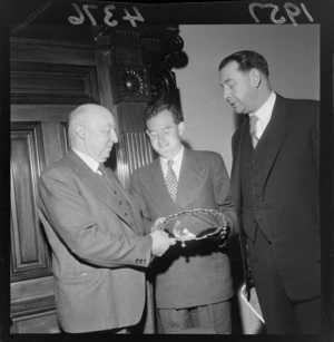 The Mayor of Wellington (Kitts) presenting a silver salver to Mr G E Pearce, with Mr H R H Chalmers