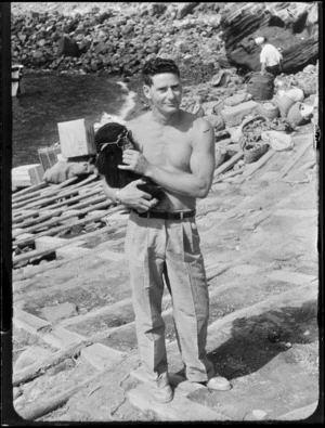 Robert Tomarchin with chimpanzee, Moko, on Pitcairn Island