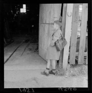 Unidentified boy outside Blacksmith workshop in Johnsonville, Wellington