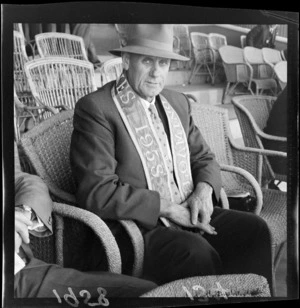 Mr W S Goosman in the grandstand at Trentham Racecourse