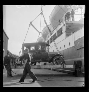 Model T car being loaded onto ship, Rangitira, going to Picton