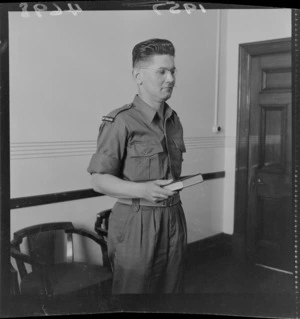 Unnamed man taking oath before departure of military force despatched to Malaya