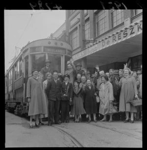 Conductor, [driver and passengers?], standing in front of the last tram to Miramar, Wellington
