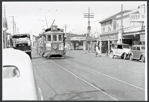 Street in New Brighton, Christchurch, with tram