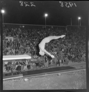 Diver, performing a somersault, evening, Olympic pool, Naenae, Wellington