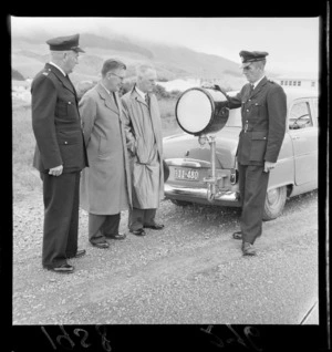 Mr C A J Peterson, Mr H B Smith and Mr J Mathison with a traffic officer, Wellington