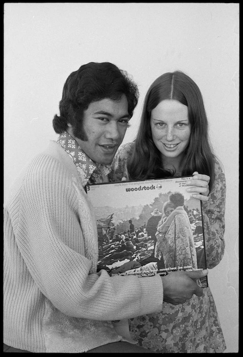 Wellington pop singer Nash Chase and competition winner Pam McLachlan, with with a three record set of the motion picture Woodstock