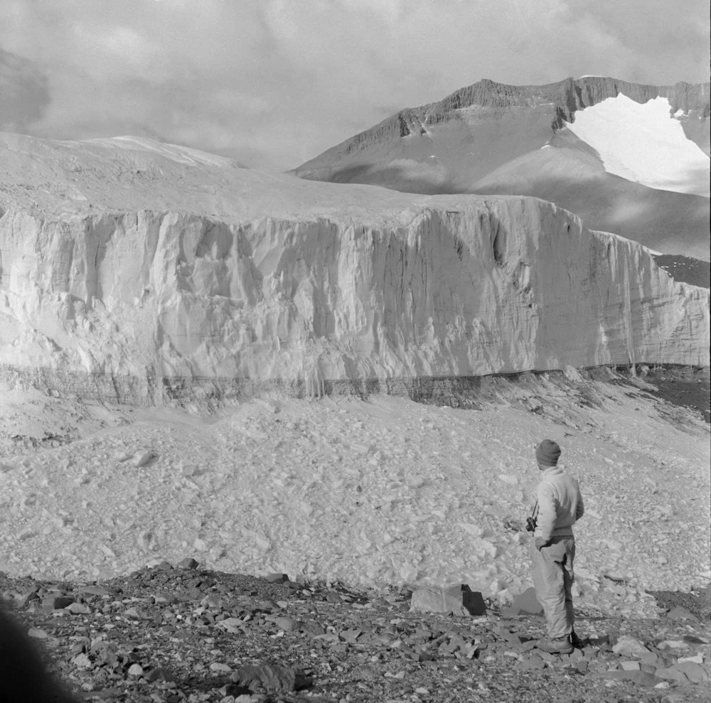 Geologist, Peter Webb, views the terminal face of the Upper Victoria Glacier