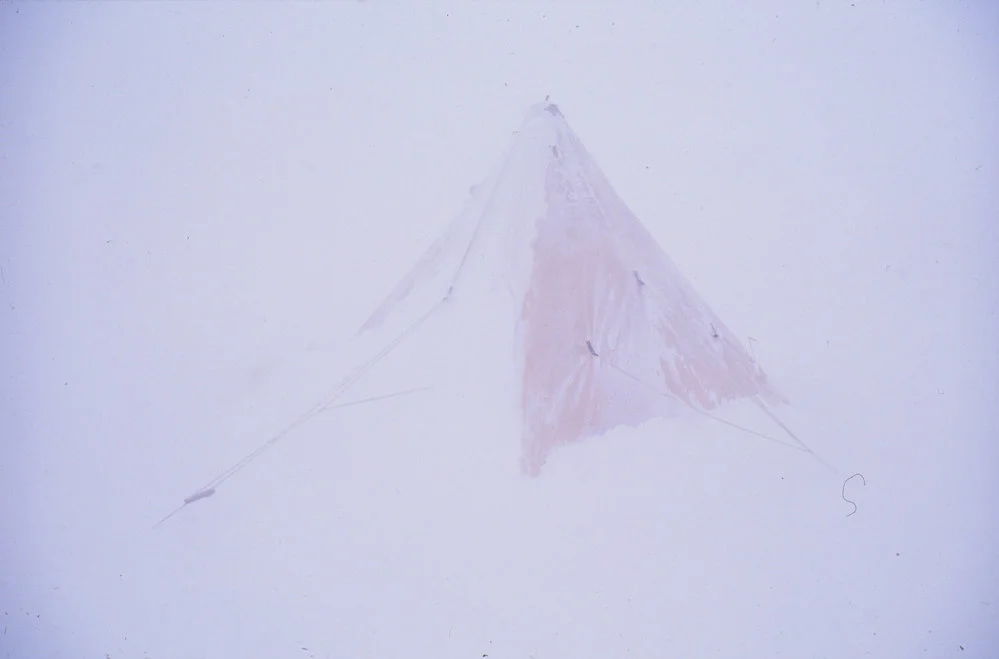 Polar tent snowed in, in blizzard/whiteout