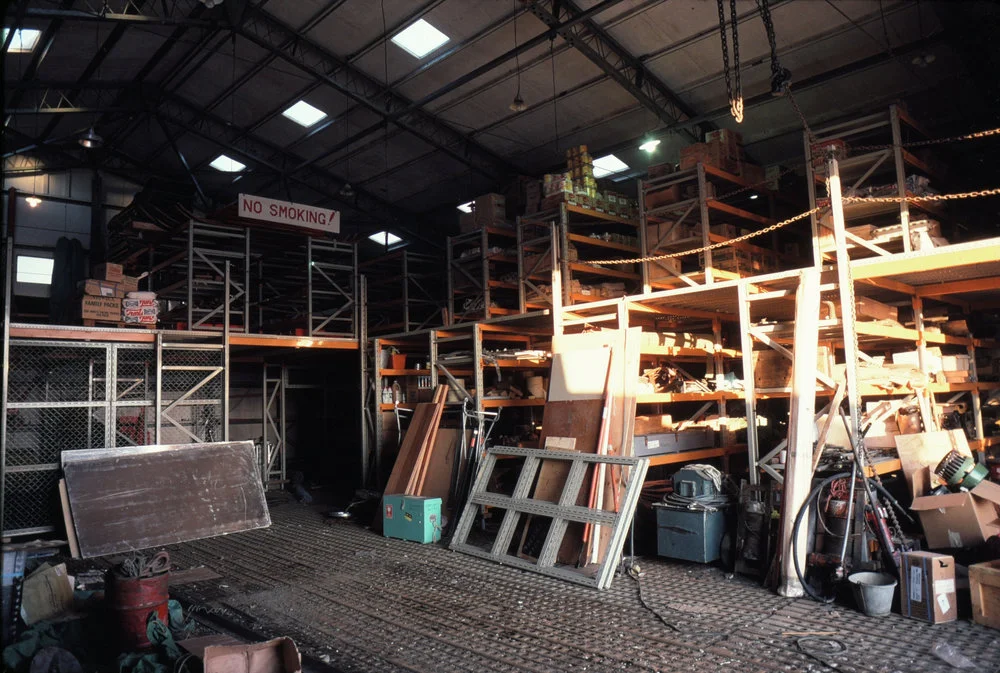 Hangar with new mezzanine floor and shelving- north and east walls